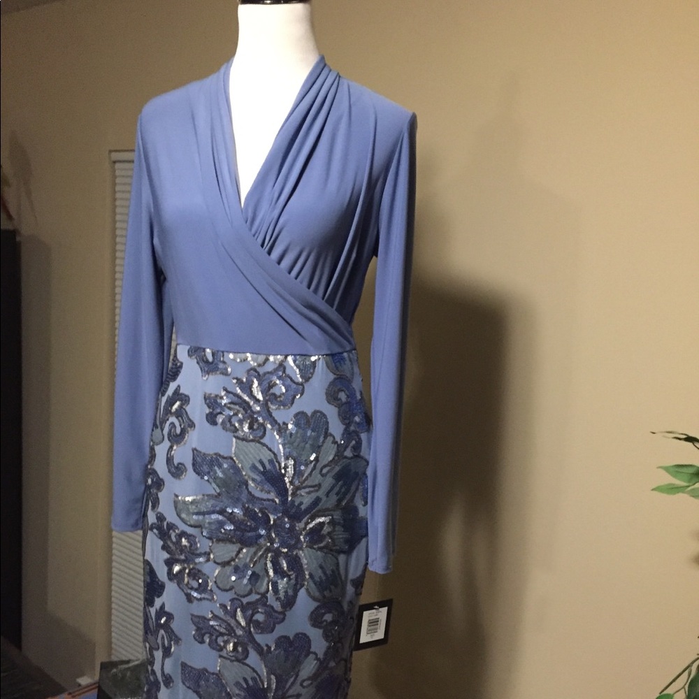 Periwinkle faux wrap sheath dress.
